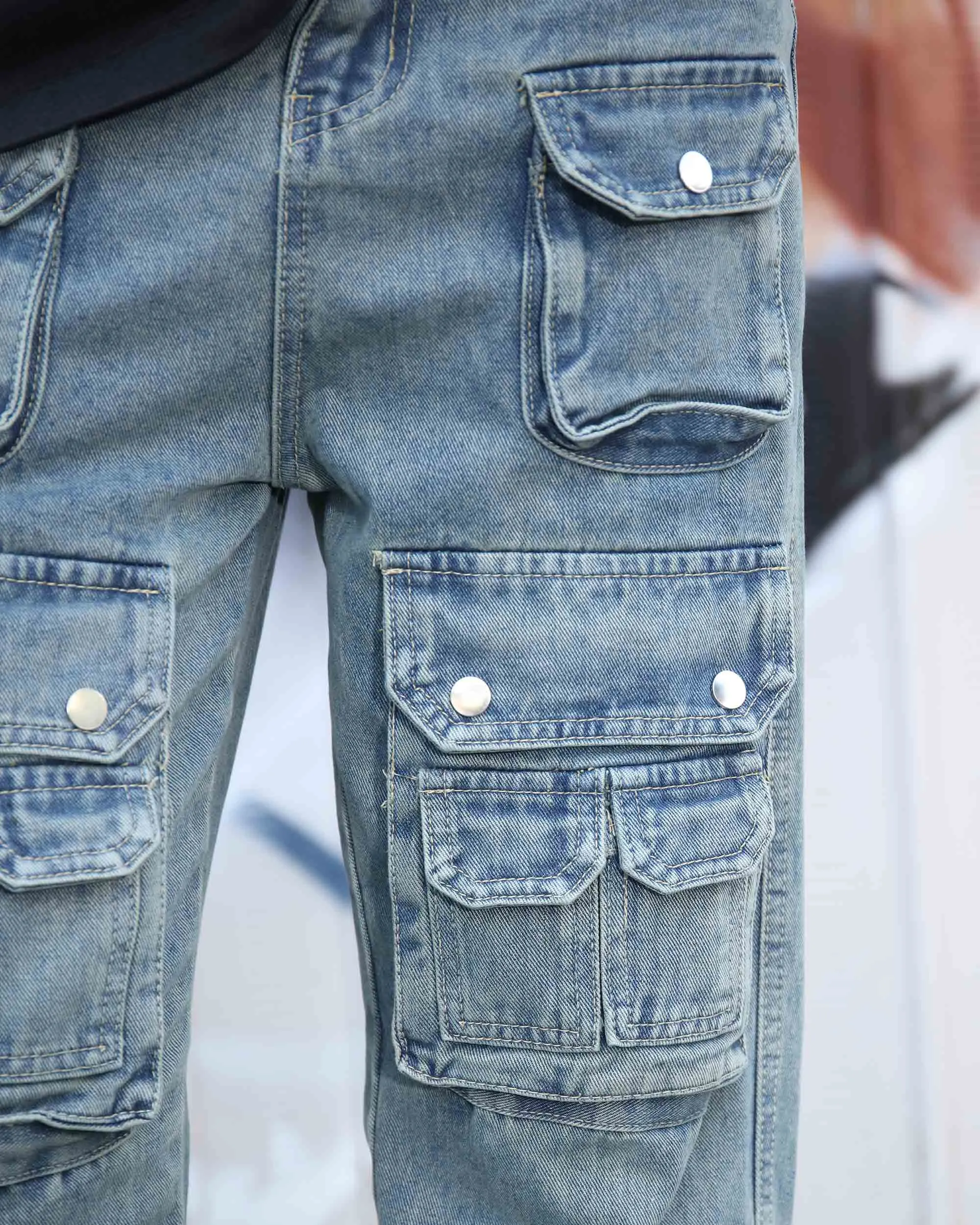 Distressed Craftsmanship in Blue Baggy Jeans with Multiple Pockets