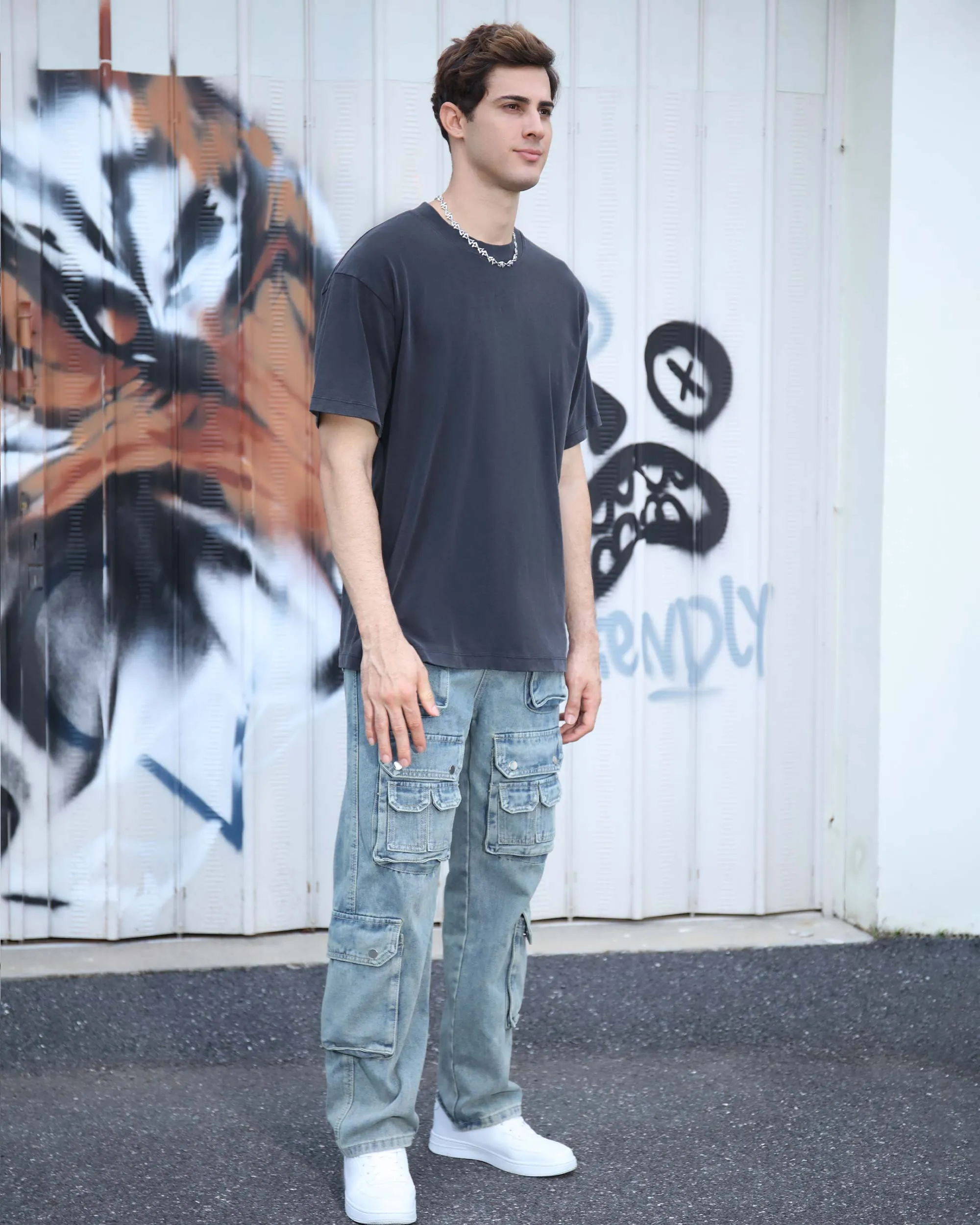 Distressed Craftsmanship in Blue Baggy Jeans with Multiple Pockets