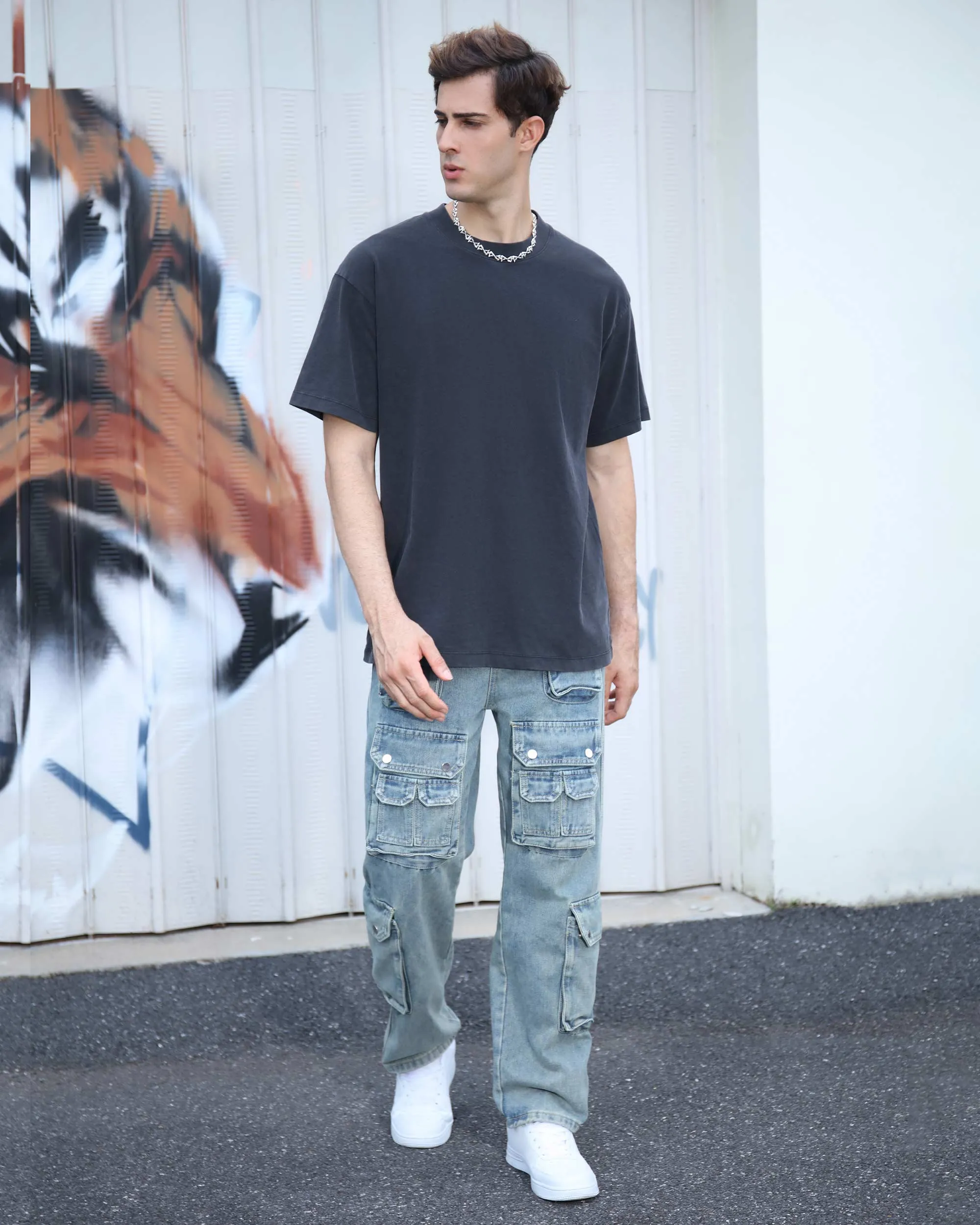 Distressed Craftsmanship in Blue Baggy Jeans with Multiple Pockets