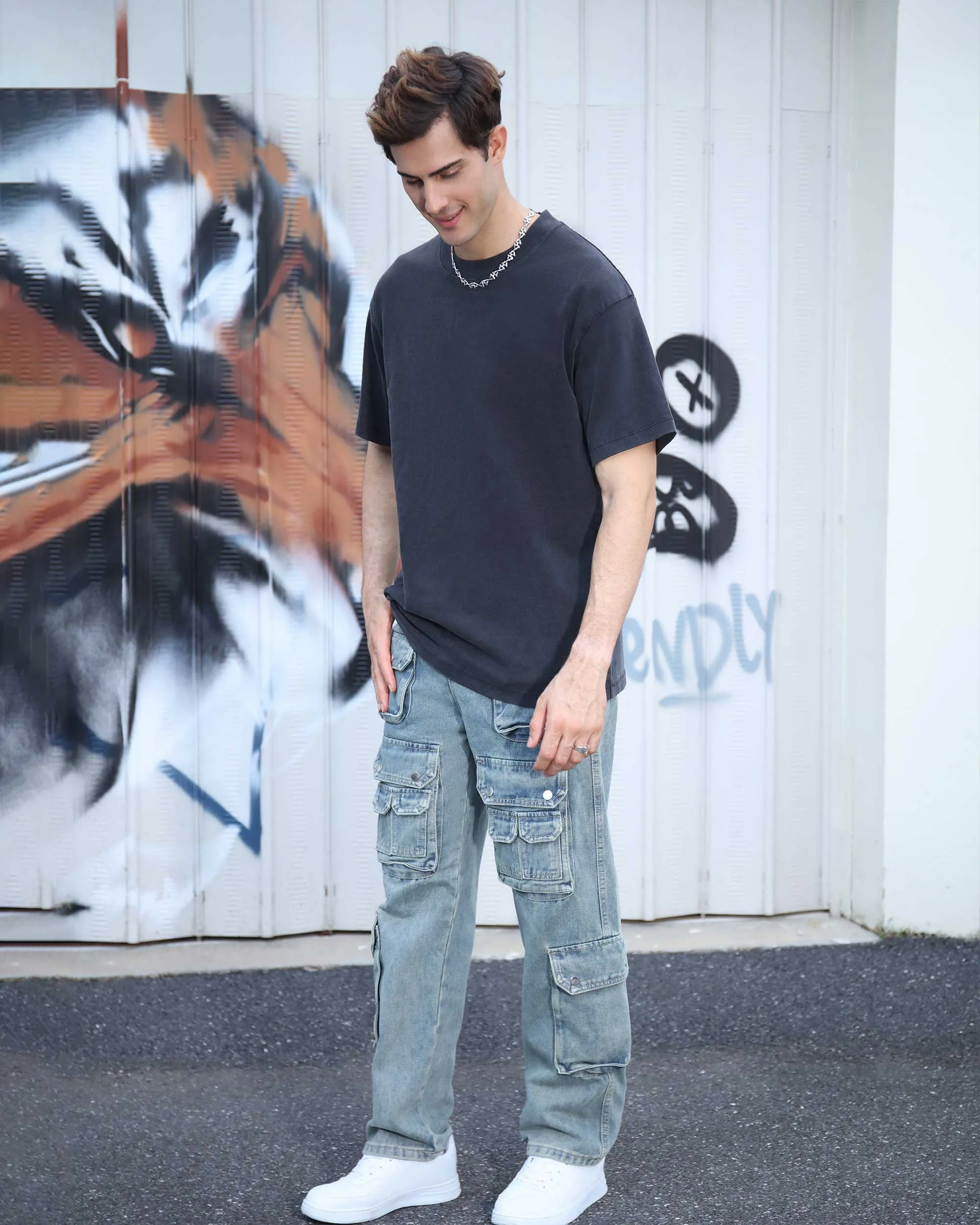 Distressed Craftsmanship in Blue Baggy Jeans with Multiple Pockets