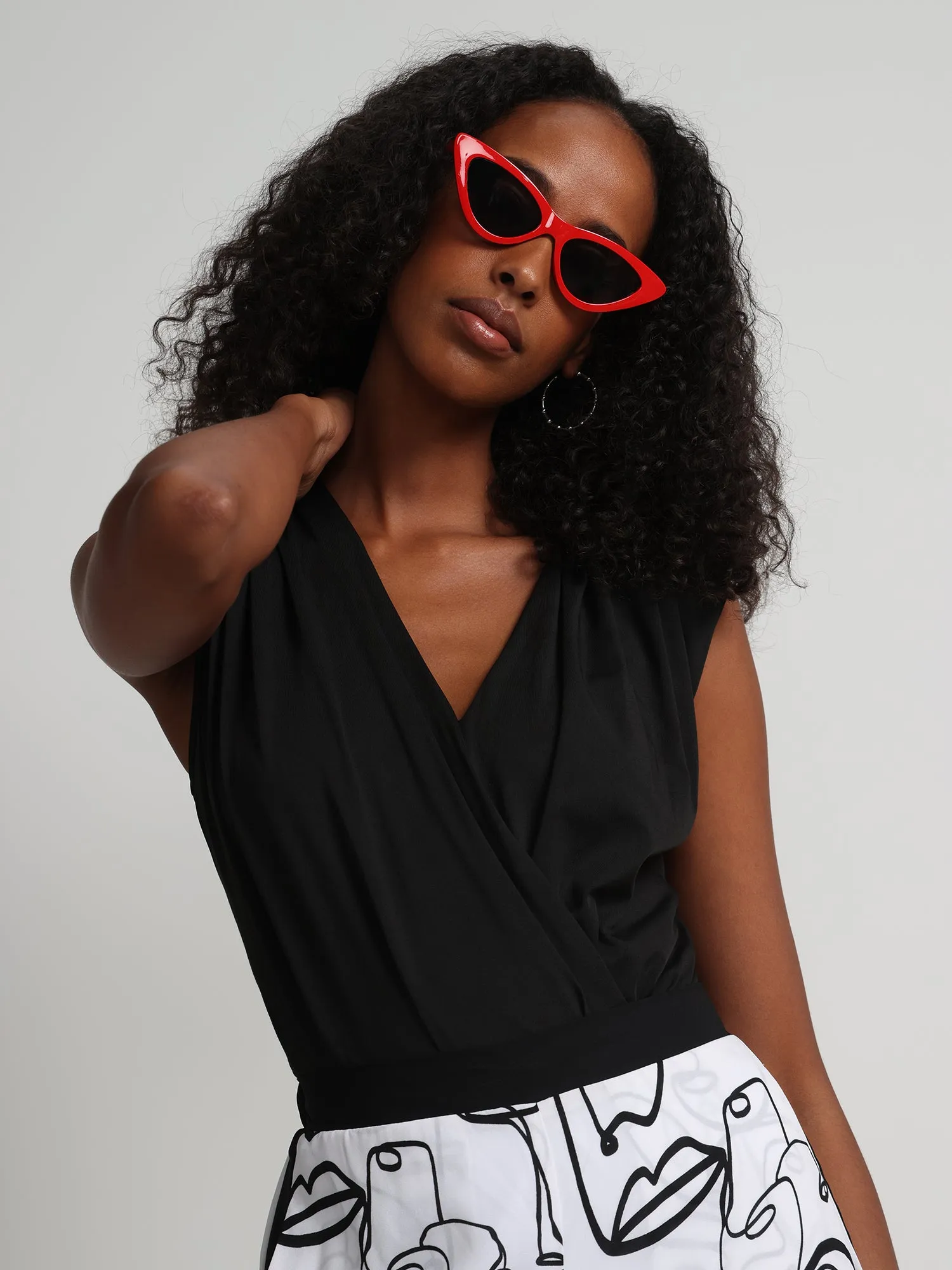 V-Neck Padded-Shoulder Knit Bodysuit